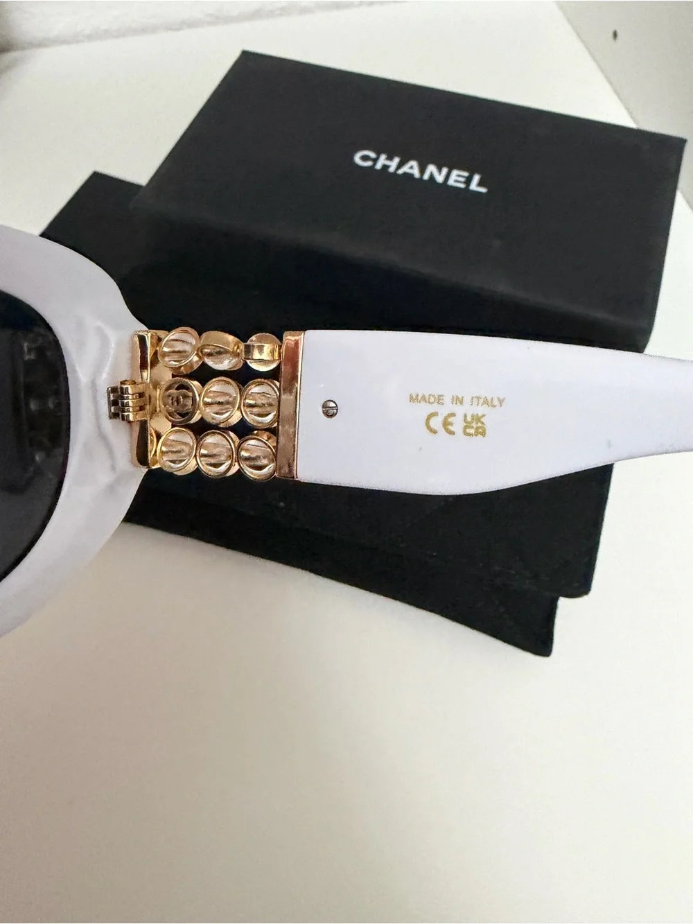 Authentic CHANEL White Round Sunglasses with Gold Chain Detail